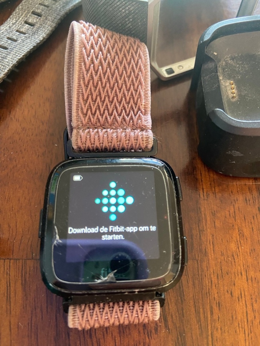 Assorted Smartwatch Fitbit Versa Oitom with Chargers and Accessories Lot Works